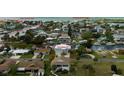 Aerial view of waterfront home on canal with direct access to the Gulf at 4469 Bahama Dr, Hernando Beach, FL 34607