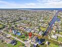 Desirable waterfront community with access to the Gulf and featuring neighborhood homes and beautiful canal at 13821 Judy Ave, Hudson, FL 34667