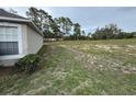 Expansive backyard offers ample space for outdoor activities and landscaping possibilities at 11308 Mahopac Rd, Weeki Wachee, FL 34614