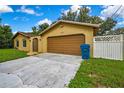 Charming single-story home with a two-car garage, a driveway, and well-maintained front yard at 2169 Danforth Rd, Spring Hill, FL 34608