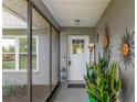 Inviting front porch with decorative accents, providing a warm welcome to guests at 2295 Rio Cir, Spring Hill, FL 34608