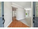 Inviting foyer showcases hardwood floors and leads into the spacious living areas at 2519 Shipston Ave, New Port Richey, FL 34655