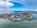 Waterfront neighborhood with canal access, offering many boat docking options in a vibrant seaside community at 336 Boca Ciega Dr, Madeira Beach, FL 33708
