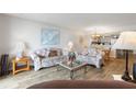 Spacious living room seamlessly flows into the kitchen, creating an open and airy space perfect for relaxing at 6035 Sea Ranch Dr # 410, Hudson, FL 34667