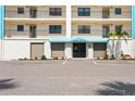 Golden Shores condo entrance with nice landscaping and a welcoming entryway at 19531 Gulf Blvd # 611, Indian Shores, FL 33785