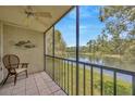 Relaxing screened lanai with water view; perfect place to enjoy the Florida weather at 3134 Lake Pine Way # F2, Tarpon Springs, FL 34688