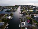 Aerial view showcasing the waterfront property's canal access and proximity to open water at 3336 Gulfview Dr, Hernando Beach, FL 34607