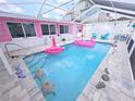 Enjoy a private screened-in pool area, perfect for entertaining and relaxation at 3336 Gulfview Dr, Hernando Beach, FL 34607