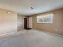 Cozy dining area features a round table, tile flooring and easy access to the kitchen for convenient meal times at 11094 Auburndale St, Spring Hill, FL 34609