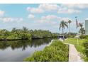 Scenic water view of the canal and lush green landscaping at 5640 Ferguson Ct # 2203, New Port Richey, FL 34652
