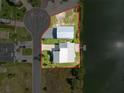 Aerial shot showing the lot outlined in red with waterfront access and a boat storage area at 3342 Turks Cap Dr, Hernando Beach, FL 34607
