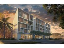 Modern building exterior with wood and concrete accents at 430 Kumquat Ct # 510, Sarasota, FL 34236