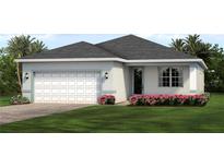 One-story home with light-blue exterior, white garage door, and landscaping at 1634 Sunset Preserve Way, Port Charlotte, FL 33953