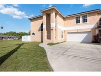 Two story home with attached garage and walkway at 1621 Dr Martin Luther King Way, Sarasota, FL 34234