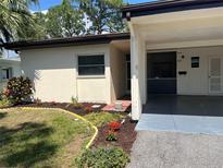 House exterior with landscaped front yard at 6201 Green View Dr # 130, Sarasota, FL 34231