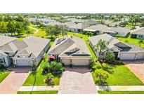 Bird's eye view of a house in a neighborhood at 27855 Arrowhead Cir, Punta Gorda, FL 33982