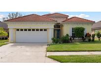 One-story house with tile roof and two-car garage at 5301 Laurel Oak Ct, North Port, FL 34287