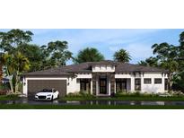 Single-Gathering home with two-car garage and lush landscaping at 5146 Damariscotta Pl, Sarasota, FL 34231