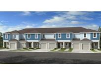 New townhouses with attached garages and modern exterior design at 8787 Winter Breeze Way, Sarasota, FL 34241