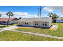 Newly renovated Ranch style home with landscaped yard at 13497 Bennett Dr, Port Charlotte, FL 33981