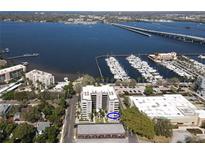 Beautiful condo building overlooking a marina and bay with bridge access to nearby cities at 1400 Barcarrota Blvd W # 201, Bradenton, FL 34205