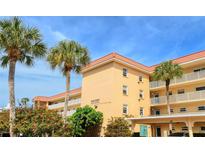 Exterior view of Dolphin Bay, a multi-story condominium building at 1215 S Portofino Dr # 308, Sarasota, FL 34242