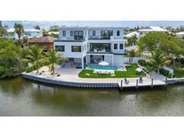 Luxury waterfront home with private pool and dock at 111 Gull Dr, Anna Maria, FL 34216