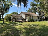 Single story home with deck and large backyard at 4090 Carlton Rd, Sarasota, FL 34240
