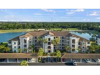 Luxury condo building with lake and golf course views at 16804 Vardon Ter # 104, Bradenton, FL 34211