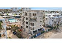 Aerial view of a modern building under construction near the beach at 1150 Windsong Ln # 200, Sarasota, FL 34242