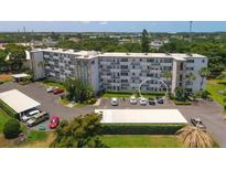 Aerial view of condo building, highlighting a specific unit at 4440 Ironwood Cir # 108D, Bradenton, FL 34209