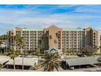 Condo building with parking and tropical landscaping at 2320 Terra Ceia Bay Blvd # 203, Palmetto, FL 34221