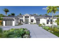 Stunning two-story home with a modern design and attractive landscaping at 1800 Webber St, Sarasota, FL 34239