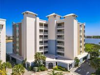 Luxury condo building with lake views and parking at 10520 Boardwalk Loop # 302, Bradenton, FL 34202