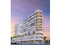 Modern building exterior with balconies and street-level shops at 290 Cocoanut Ave # Ph C, Sarasota, FL 34236