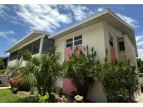 Two-story building with pink accents at 2501 Beneva Rd # 8, Sarasota, FL 34232
