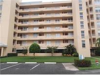 Exterior view of a light beige multi-story building at 4410 Fairways Blvd # 602, Bradenton, FL 34209