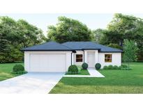 White house with a two-car garage at 23453 Winthrob Ave, Port Charlotte, FL 33980
