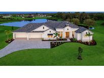 Luxury home on a large lot with a lake view and 3-car garage at 3582 Recurve Cir, Sarasota, FL 34240