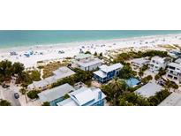 Aerial view of beach homes near the ocean at 107 Elm Ave, Anna Maria, FL 34216