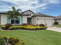 Beautiful one-story house with a two car garage and landscaped yard at 3510 67Th E Ter, Sarasota, FL 34243