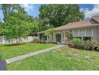 Ranch home with a walkway and well-maintained lawn at 773 N Jefferson Ave # 773, Sarasota, FL 34237