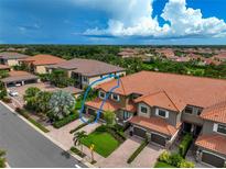 Aerial view of townhome with two-car garage at 13514 Messina Loop # 102, Bradenton, FL 34211