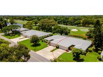 Aerial view showing house location and surrounding area at 5617 Palm Aire Dr, Sarasota, FL 34243