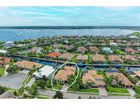 Aerial view showcasing home's location in upscale waterfront community at 4713 Mainsail Dr, Bradenton, FL 34208