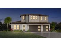 Two-story home with modern design and two-car garage at 2609 Waterfront Cir, Sarasota, FL 34240
