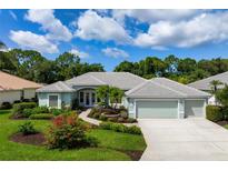 Beautiful two-story home with a three-car garage at 5249 Far Oak Cir, Sarasota, FL 34238