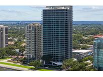 Luxury high-rise building with modern architecture and water views at 2912 W Santiago St # 2004, Tampa, FL 33629