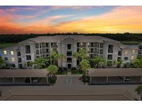 Luxury condo building with parking and beautiful landscaping at 17704 Gawthrop Dr # 402, Bradenton, FL 34211