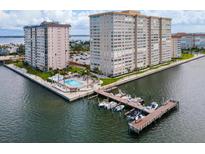 Aerial view of waterfront community with pool and boat docks at 5200 Brittany S Dr # 602, St Petersburg, FL 33715